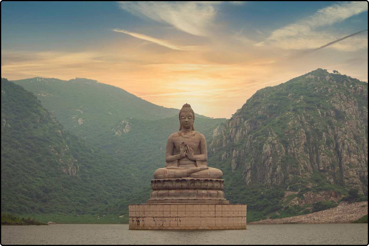 Lord Buddha statue surrounded by the natural beauty of Ghora Katora Lake.